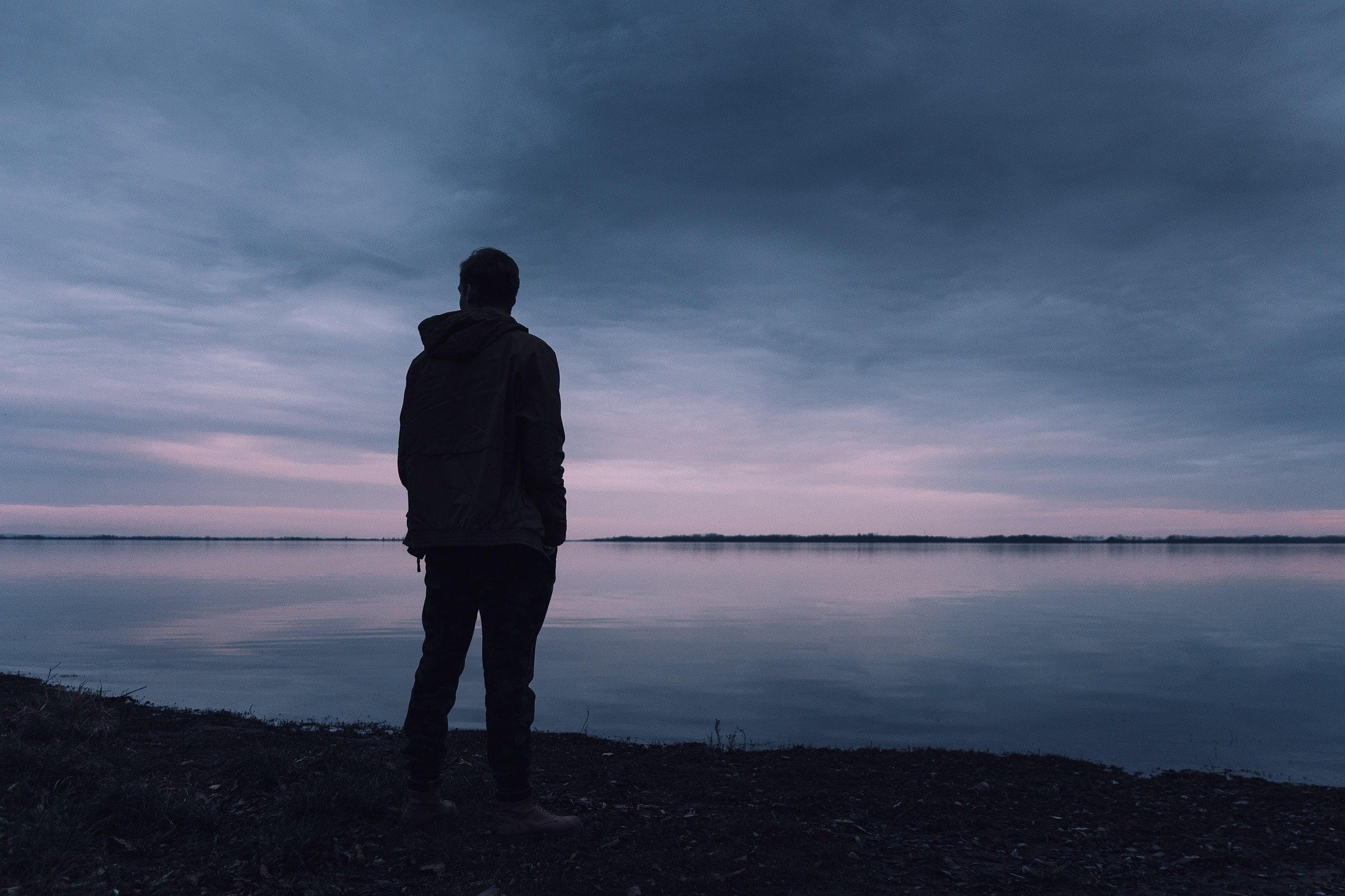 man-2915187-1920.jpg man on beach watching sunset